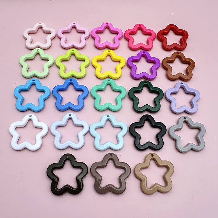 Color five-pointed star acrylic keychain pendant, candy-colored earphone cover pendant, small fresh couple bag decoration.