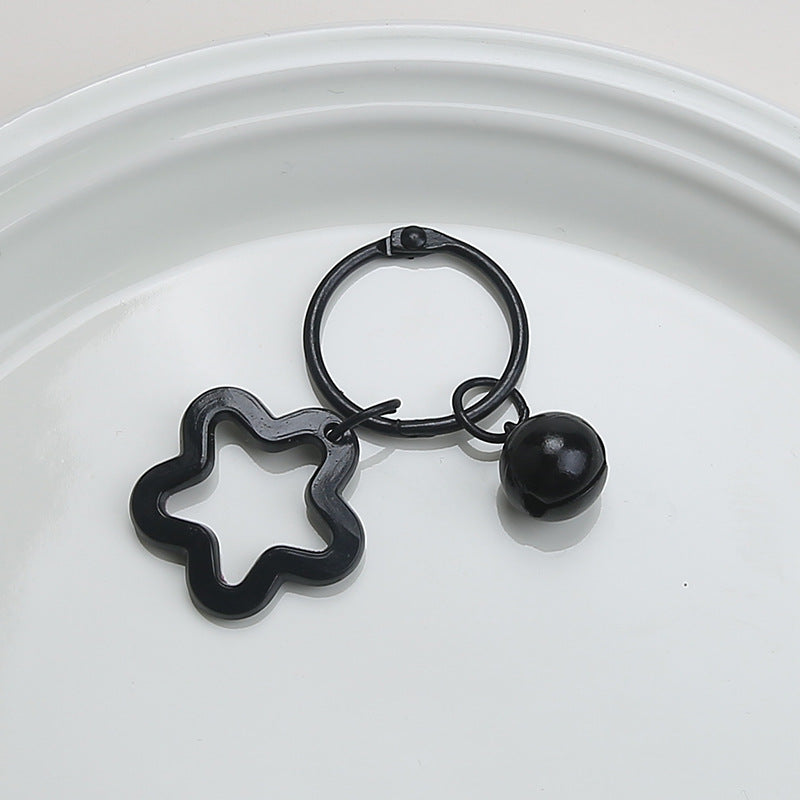 Color five-pointed star acrylic keychain pendant, candy-colored earphone cover pendant, small fresh couple bag decoration.
