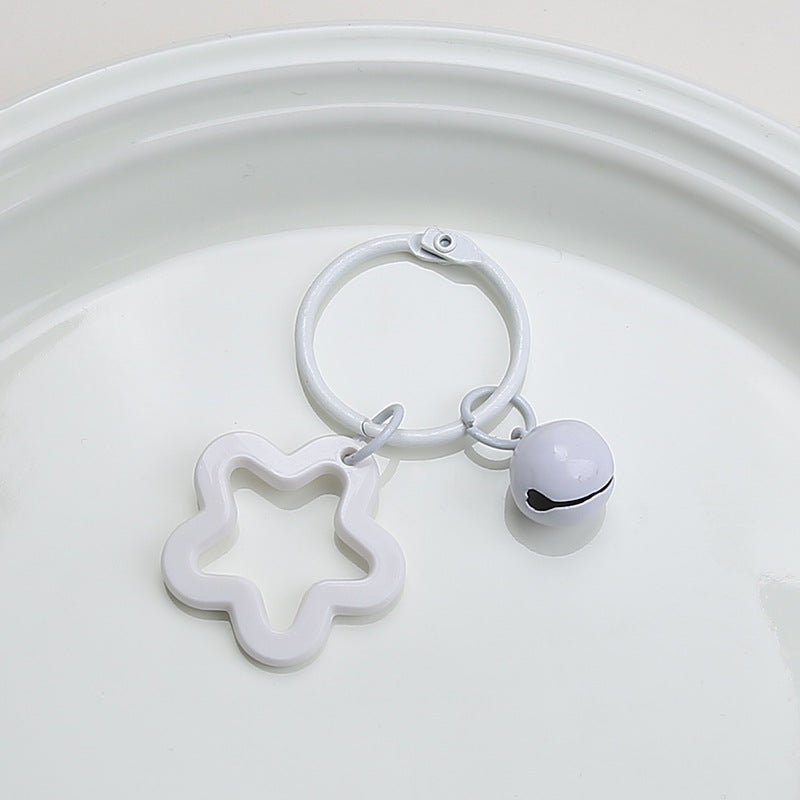 Color five-pointed star acrylic keychain pendant, candy-colored earphone cover pendant, small fresh couple bag decoration.