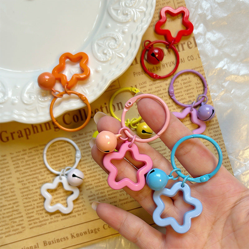 Color five-pointed star acrylic keychain pendant, candy-colored earphone cover pendant, small fresh couple bag decoration.