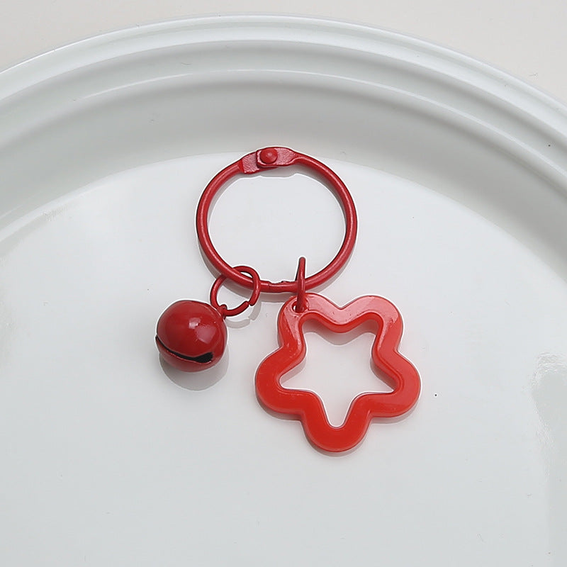 Color five-pointed star acrylic keychain pendant, candy-colored earphone cover pendant, small fresh couple bag decoration.