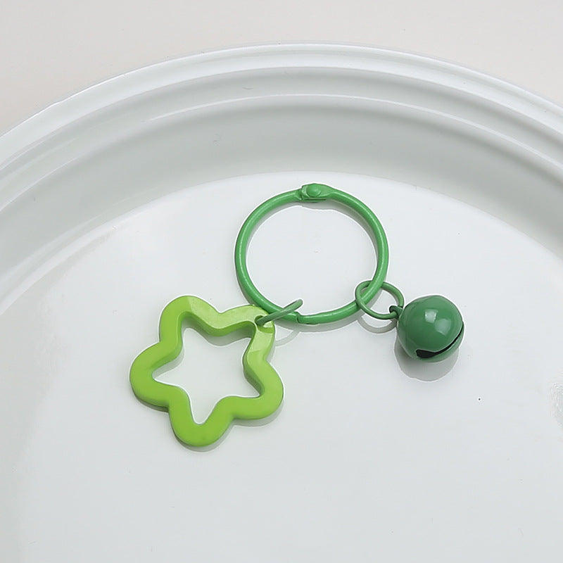 Color five-pointed star acrylic keychain pendant, candy-colored earphone cover pendant, small fresh couple bag decoration.