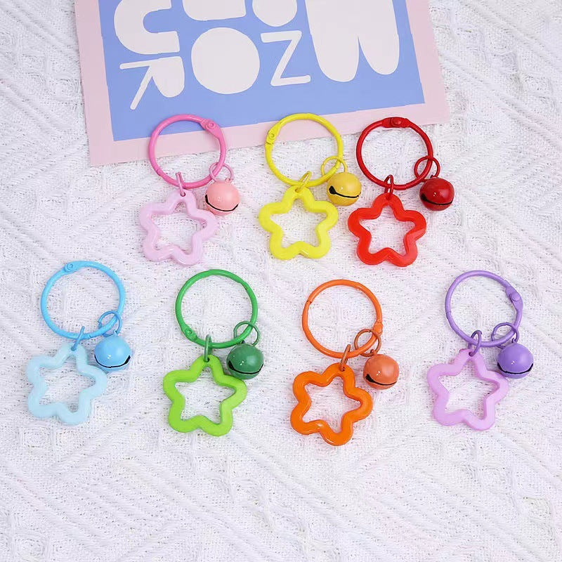 Color five-pointed star acrylic keychain pendant, candy-colored earphone cover pendant, small fresh couple bag decoration.