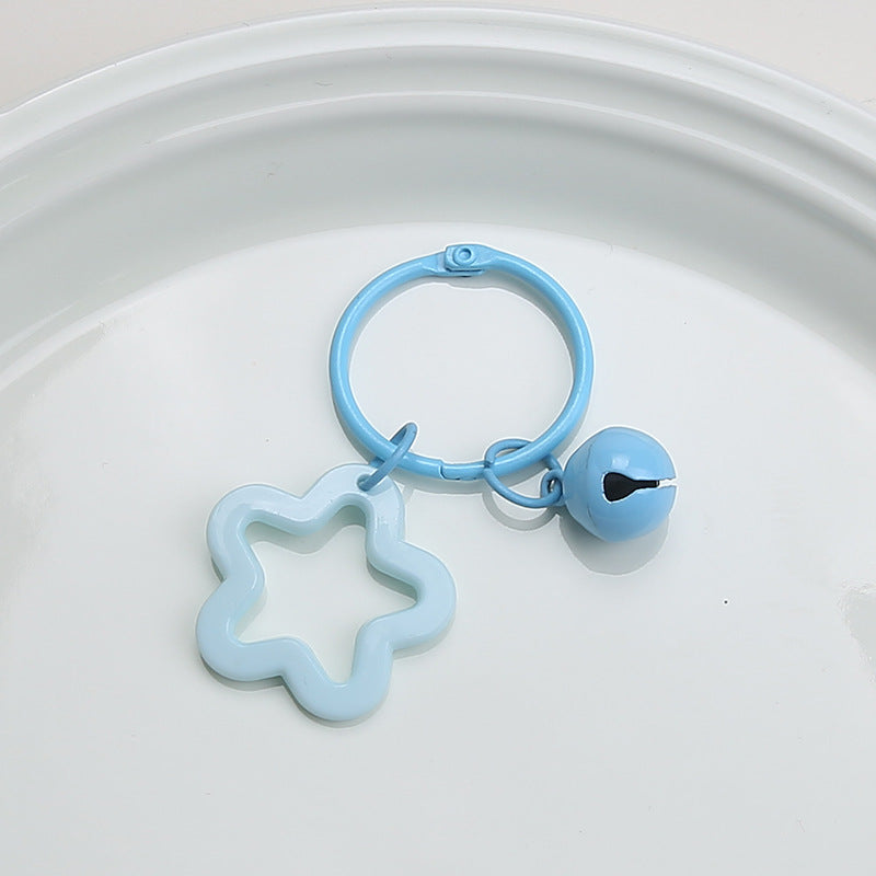 Color five-pointed star acrylic keychain pendant, candy-colored earphone cover pendant, small fresh couple bag decoration.