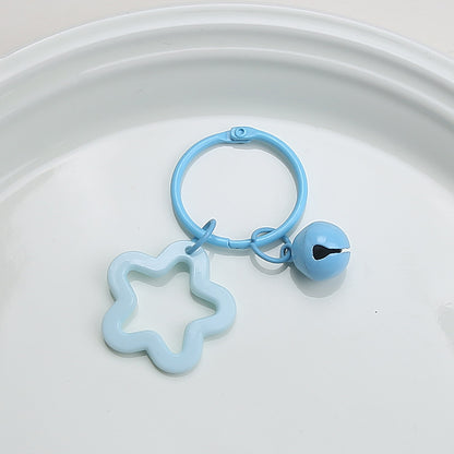Color five-pointed star acrylic keychain pendant, candy-colored earphone cover pendant, small fresh couple bag decoration.