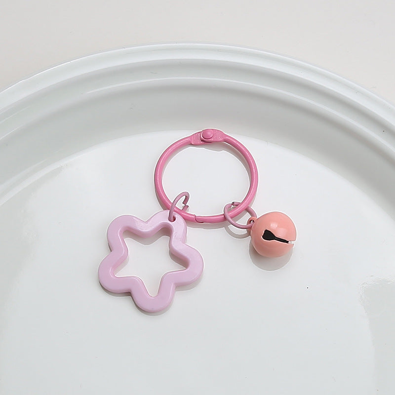 Color five-pointed star acrylic keychain pendant, candy-colored earphone cover pendant, small fresh couple bag decoration.