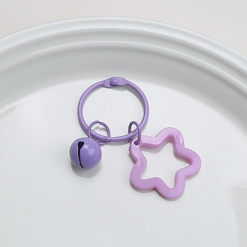 Color five-pointed star acrylic keychain pendant, candy-colored earphone cover pendant, small fresh couple bag decoration.